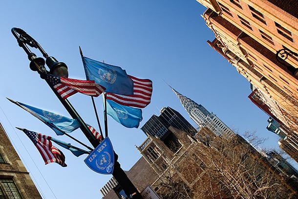 American and UN Flags flying on UN Way near the Chrysler building in New York City. Image shot 03/2008. Exact date unknown.