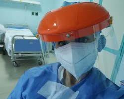 Laura Lupi wearing personal protective gear.