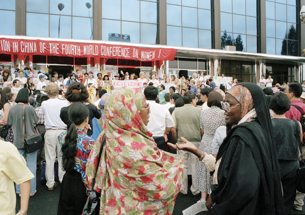 Crowd gathering outside venue in Beijing