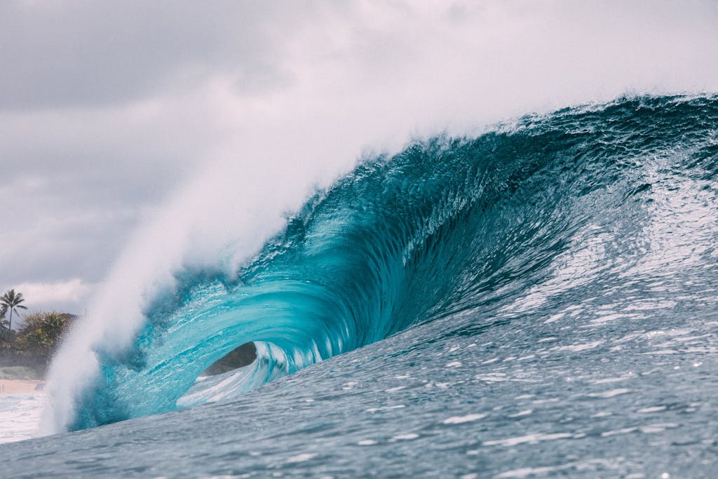 An ocean wave crashes in Hawaii.
